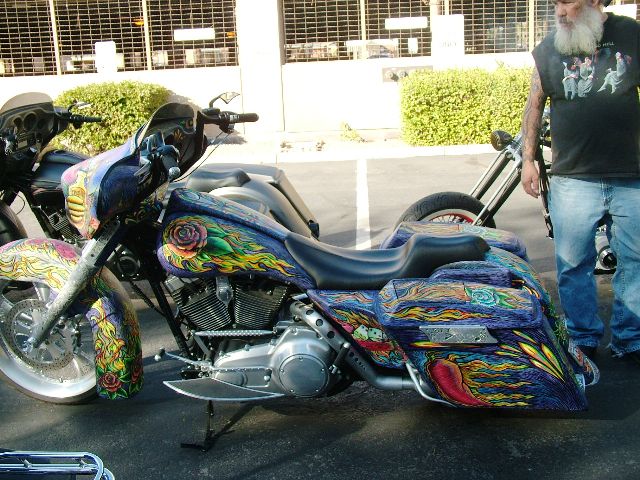 Rocky Inspecting Another Paul Yaffe's Bike